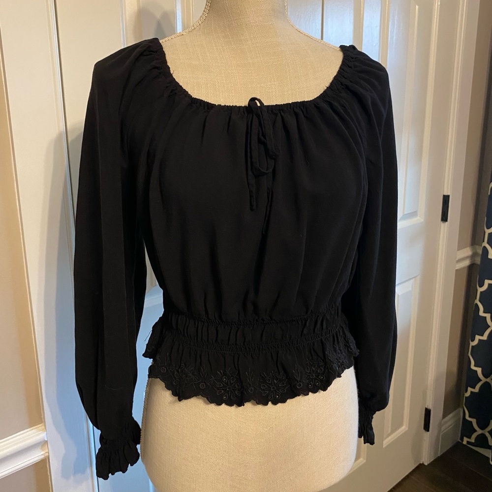 Short Black top with lace on bottom and sleeves